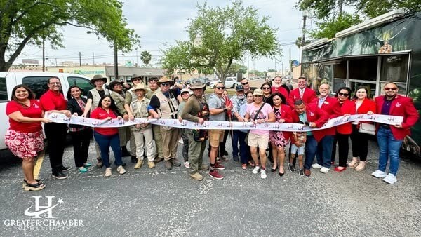 Ribbon cutting for Jurassic RGV food truck, showcasing Chamber support for local business growth.