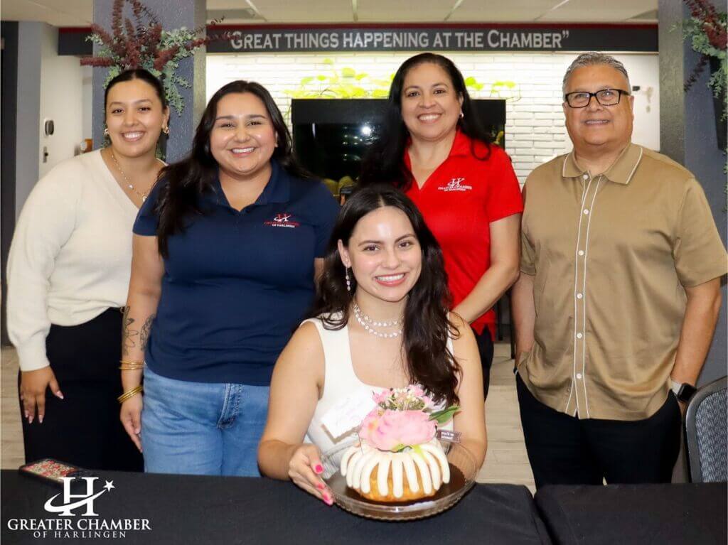 Chamber members in Harlingen share a moment of connection and celebration, reflecting community support that helps families and businesses thrive.