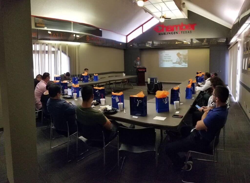 Attendees participate in a Harlingen TX business networking lunch and learn at the Greater Chamber, featuring a presentation by Spectrum Reach.