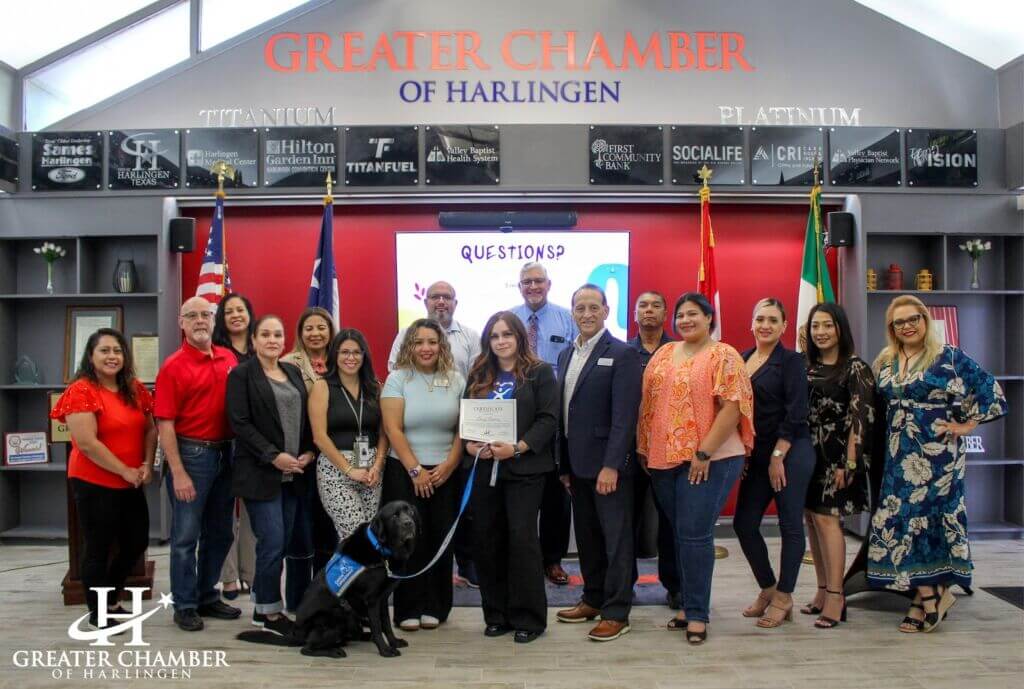 Group photo at the Greater Chamber of Harlingen during Business Over Breakfast featuring Lacey Ambriz of CASA, highlighting support for children in foster care.
