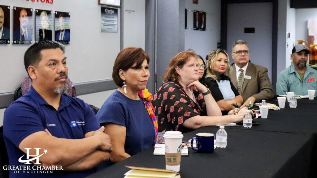 Attendees enjoy conversation and coffee during the Business Over Breakfast event hosted with Beacon Administrative Consulting in Harlingen, highlighting collaboration and connection within the local business community.