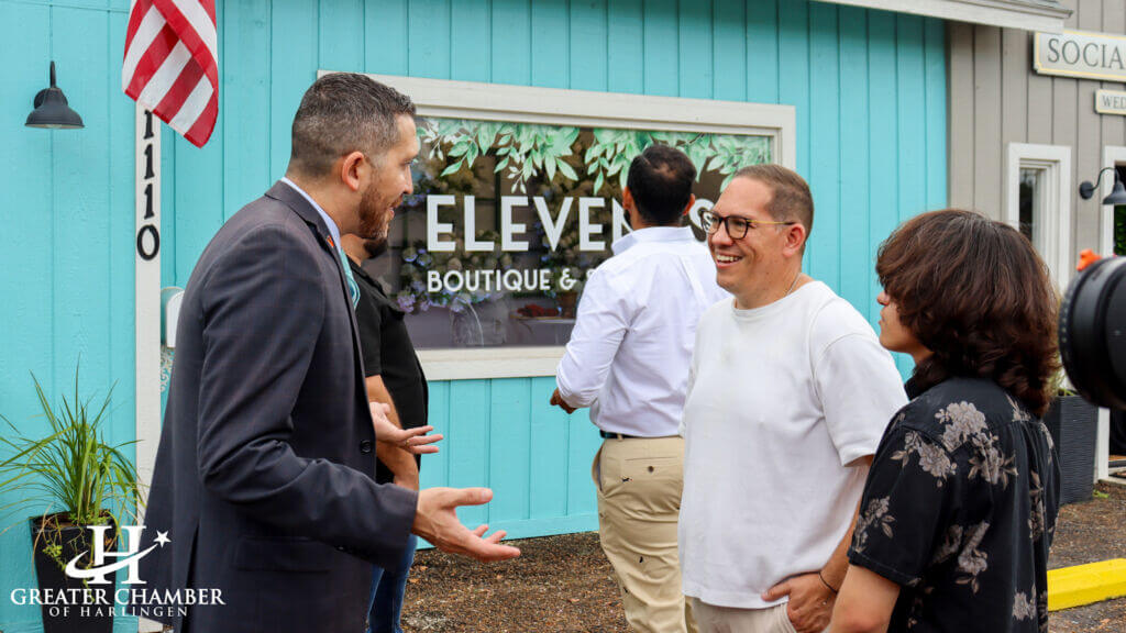 Guests gather at the opening of Elevents, an event rentals and event design business, with attendees chatting and exploring the setup, reflecting Harlingen’s supportive community atmosphere.