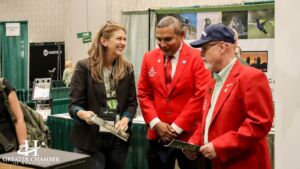 Chamber members and participants share a friendly moment at the Rio Grande Valley Birding Festival ribbon cutting, reflecting the welcoming community spirit and what it is like to live in Harlingen TX.