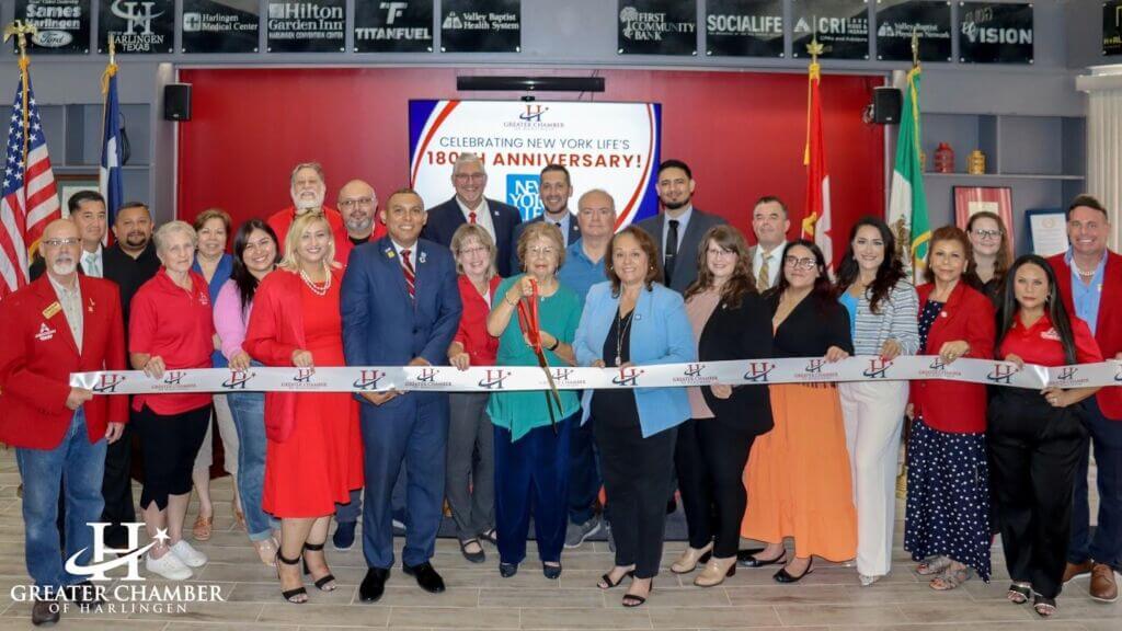 Business professionals networking at a Greater Chamber of Harlingen event to build visibility and community connections.