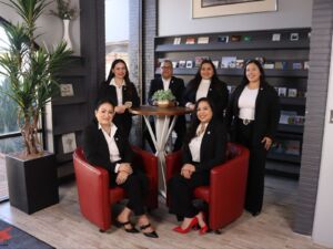 Greater Chamber of Harlingen staff smiling together in the office, ready to support local businesses with guidance, connections, and member services.