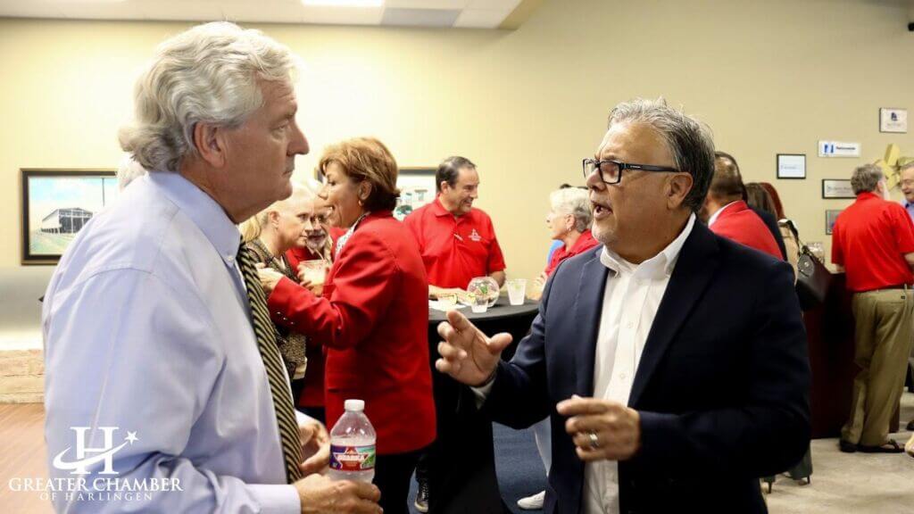 Business owners networking at a Greater Chamber of Harlingen event to build referrals and professional connections