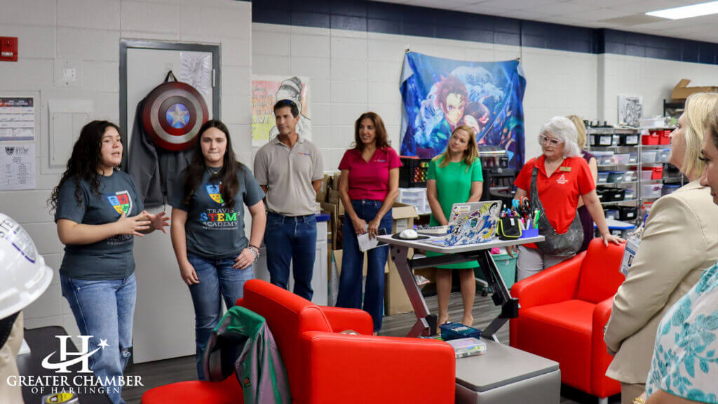 Students and staff at Travis STEM² Academy speak to visiting Greater Chamber of Harlingen members during the campus ribbon cutting, highlighting the new K through 8 STEM focused program and the district’s commitment to hands-on learning and innovation.