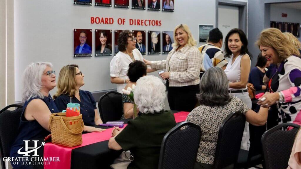 Entrepreneurs collaborating in a coworking space during a Greater Chamber of Harlingen startup meetup.