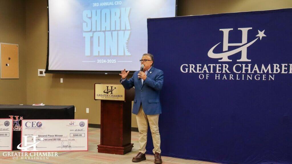 Chamber staff guiding business owners on aligning operations with districts, partners, and programs in Harlingen.