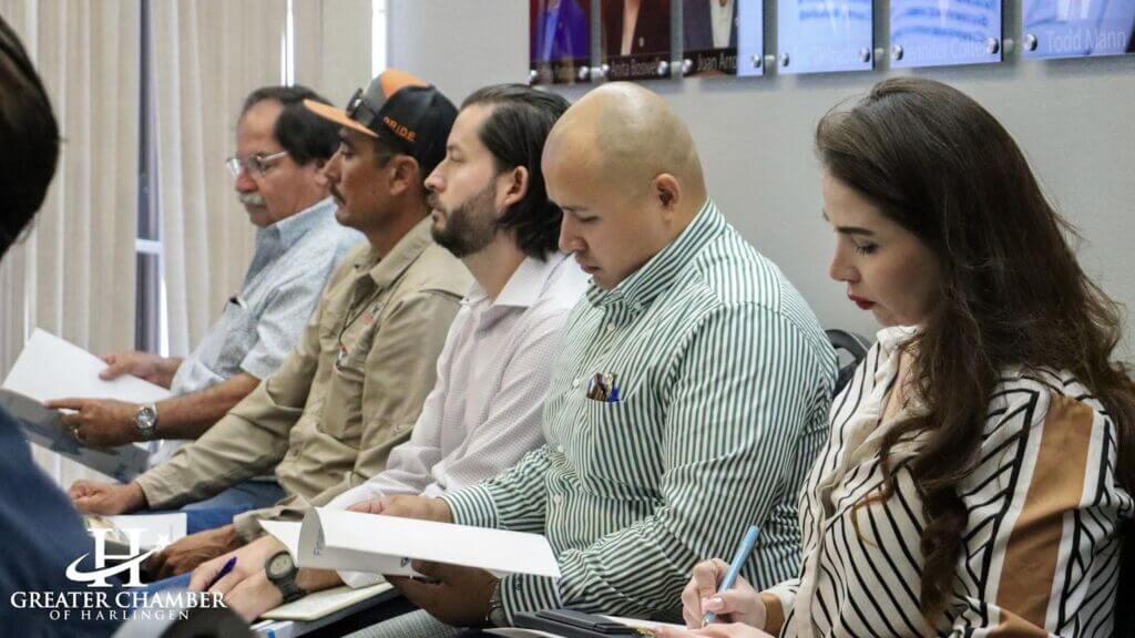 Business professionals reviewing market research and data to make informed growth and expansion decisions.