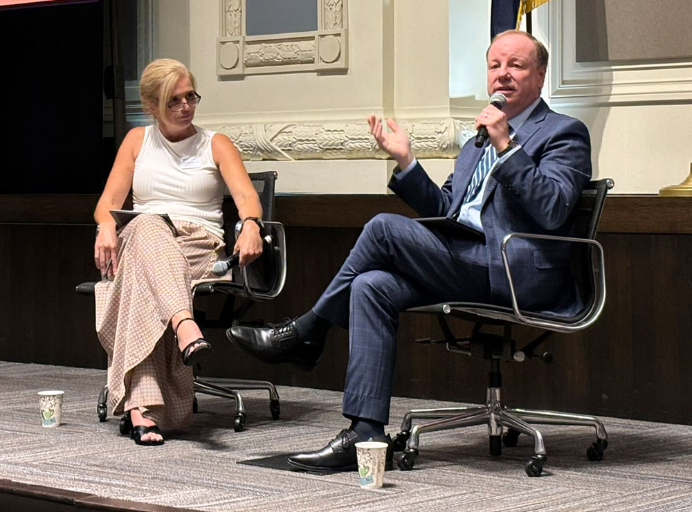 Tracey DeMarea, left, Executive Director of the Mid-America LGBT Chamber of Commerce, interviews Joe Reardon, President/CEO of the Greater Kansas City Chamber of Commerce, during the Central Exchange CEO Series lunch, Tuesday, Aug. 27, 2024.