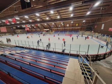 massena ice rink with people skating