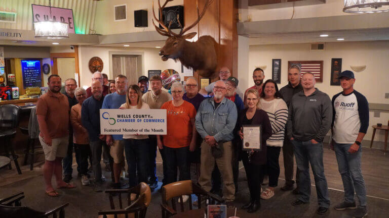 A group photo consisting of Elk's Lodge leadership, Chamber Members, and Chamber Ambassadors celebrating Elk's Lodge for becoming the April 2026 Member of the Month.
