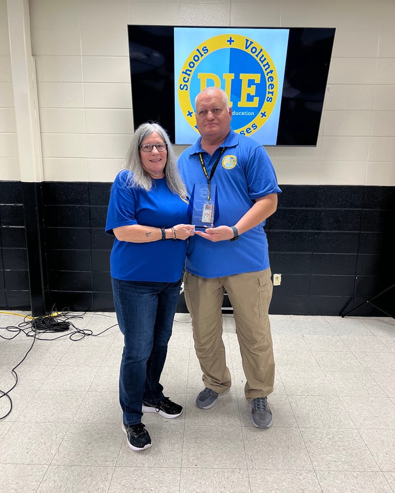Greg Yates awards PIE Founder Cora Hefner a Lifetime Achievement Award