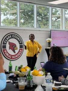 Coach Colene speaks at the Clark County Community Center