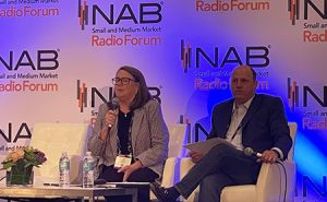 WLEN'S Julie Koehn at the mic as part of the NAB Show Small Market Radio Forum
