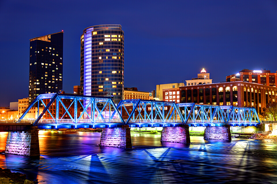 Grand Rapids Michigan skyline along the banks of the Grand river.