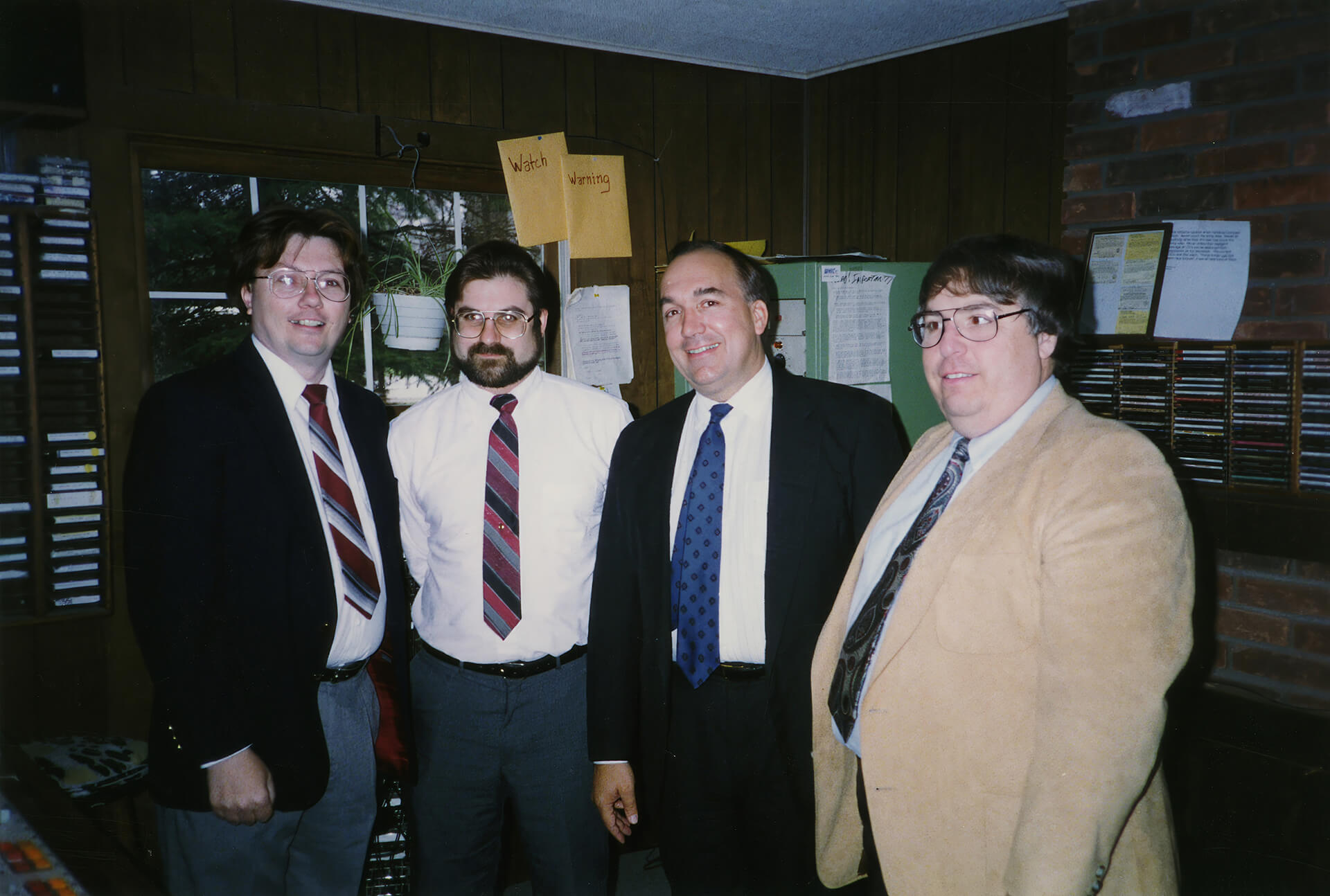 Don Backus, Marty Pennoni, Governor John Engler, and Tom Ferguson in the WDBI-FM control room