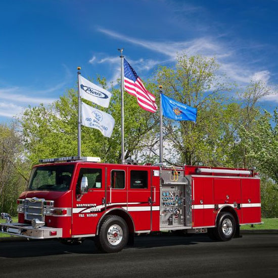 Fire truck in front of flags
