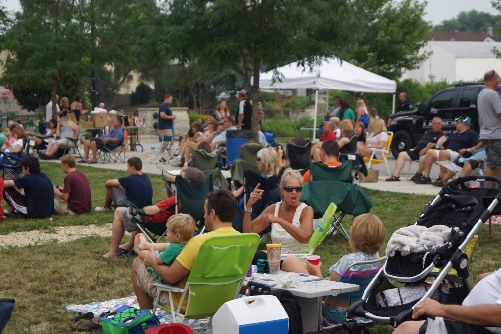 Crowd listening to Giving Back to Lemont concert in 2015.