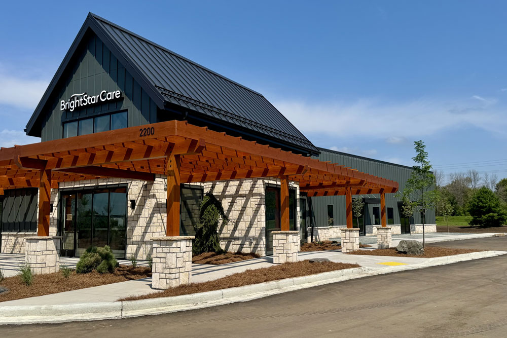 building entrance with pergola