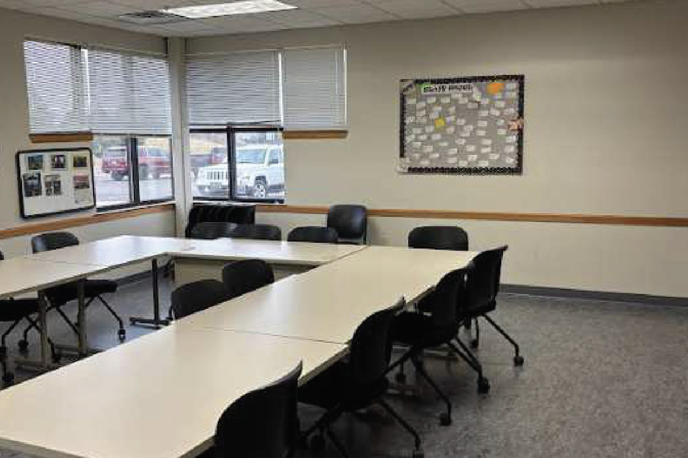 conference room with large tables and chairs.