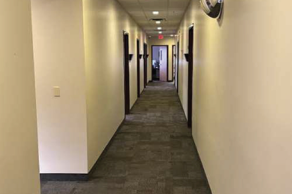 hallway to office spaces.
