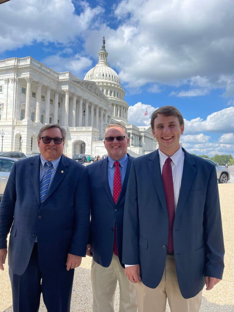 NADA Director Ted Smith, Nunally Chevrolet’s Gan Nunnally and Grant Nunnally