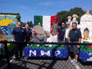 The Greater NHP Chamber marched in the Memorial High School Day Parade.