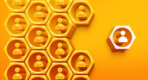 Leadership #2 Visual metaphor for individuality or standing out. A honeycomb pattern of orange user icons features one contrasting white icon. Represents uniqueness, difference, leadership, or a distinct position within a community, network, or organization structure.