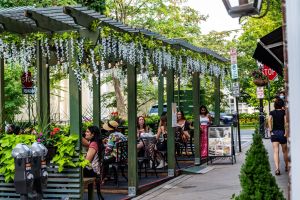 people talking and eating at palmer square