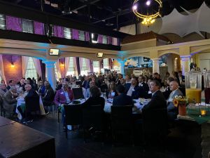 crowd listening to speakers