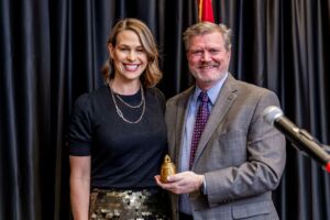 19 USE ETEC Annual Meeting 2025-Cortney and Bill - Passing the Bell 19 USE ETEC Annual Meeting 2025-Cortney and Bill - Passing the Bell