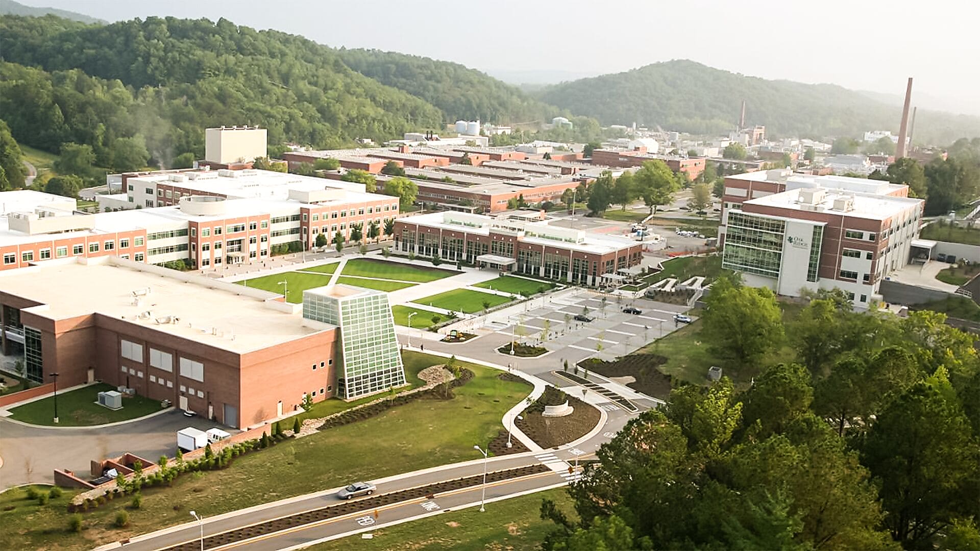 The Oak Ridge National Laboratory campus surrounded by the green hills of East Tennessee