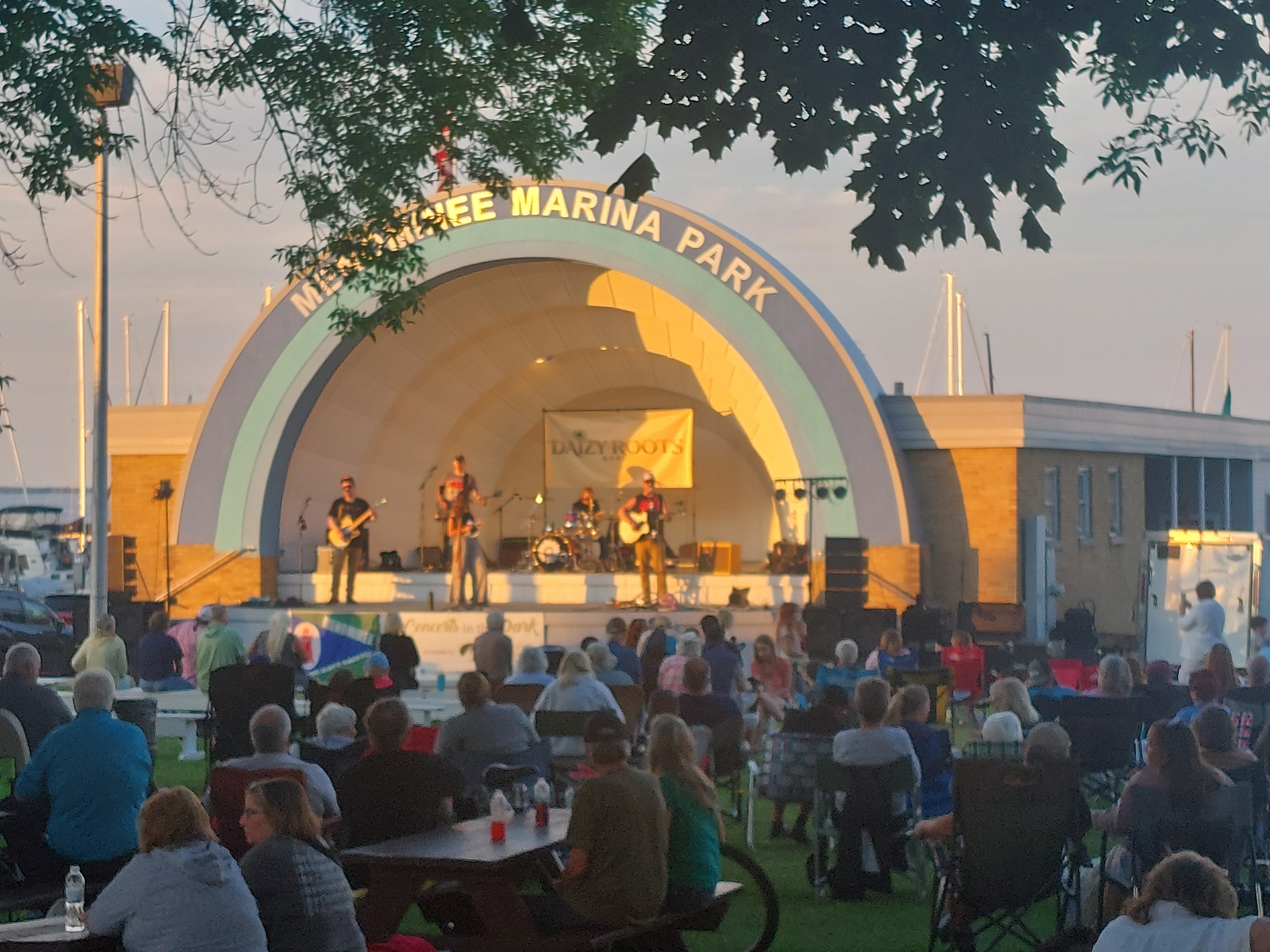 Daizy Roots Band Performing at the Menominee Marina Bandshell for the 8.21.25 Concert in the Park