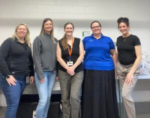 WAVE members volunteering at the April 2026 Filling Backpacks Program