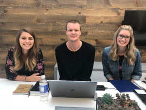 Baylee, Chandler & Emily at a Monday morning staff meeting.