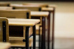 Empty classroom with desks chair iron wood for studying lessons