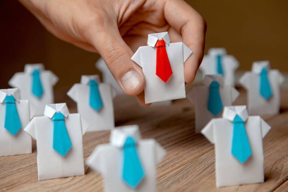 Employers graphic of miniature dress shirts and ties