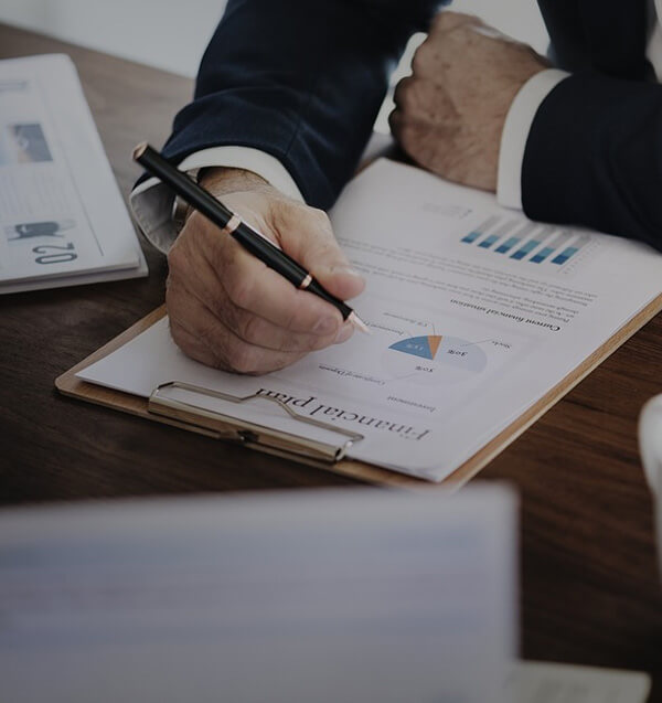 busines man looking at chart