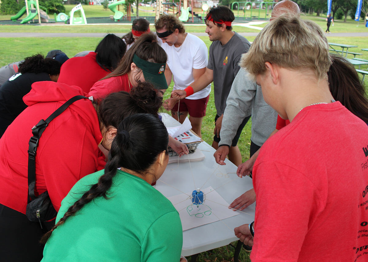 Team at Chamber Champions League doing the group draw activity