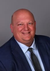 Headshot of Brad Trahan.
