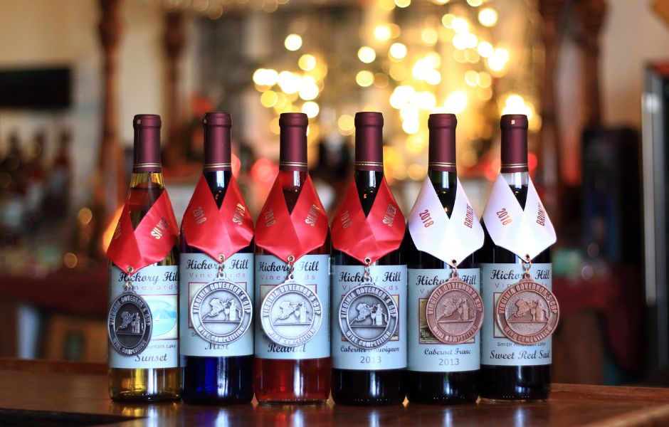 Wine bottles with medals lined up