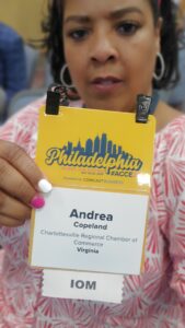 CEO Andrea Copeland with conference badge
