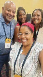 CEO Andrea Copeland with other conference members