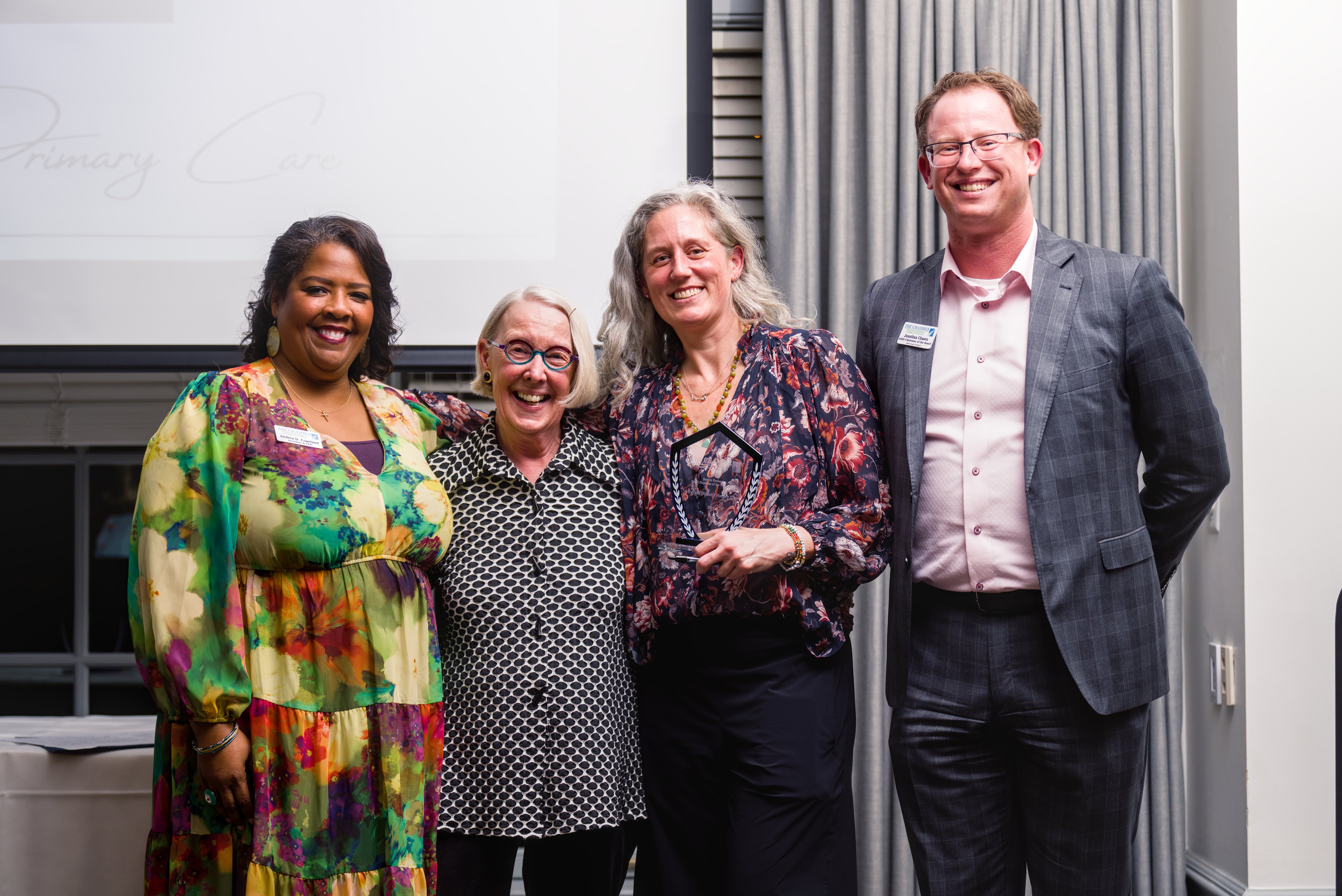 Dr. Lindsey Neal accepting the Small Business of the Year Award on behalf of VADPC.
