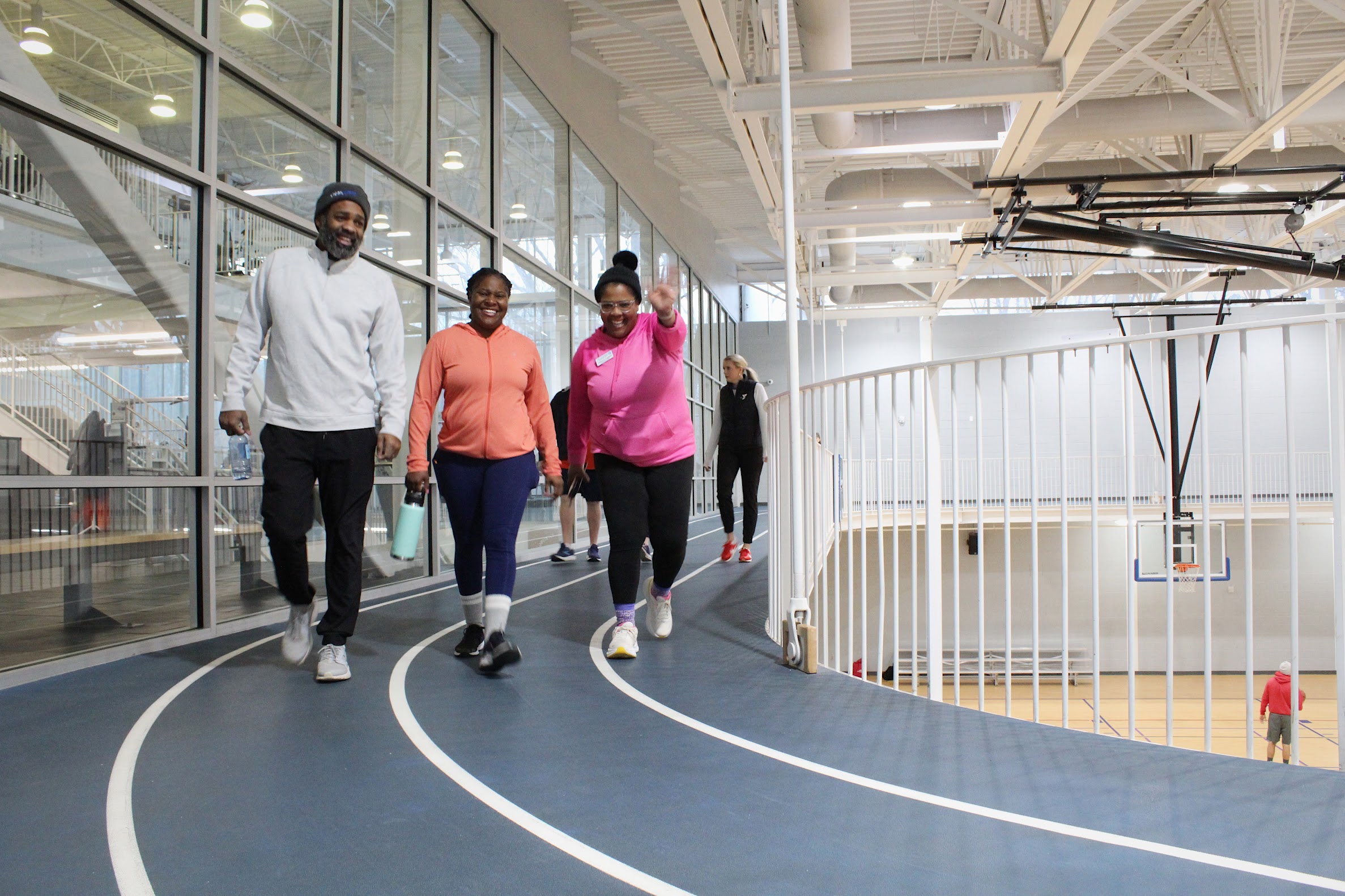Andrea Copeland walking alongside two Chamber members.