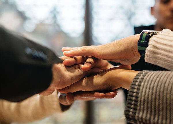 People Putting Hands Together