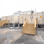 Two portable crisis buildings supplied through MBI members set up outside a medical center