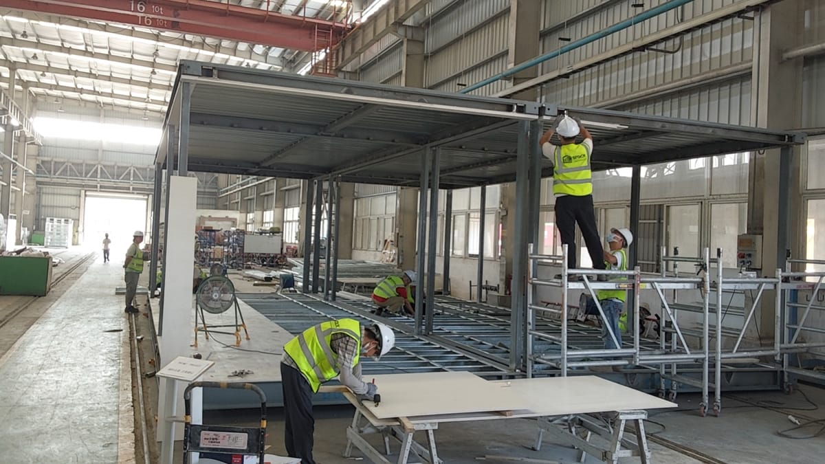 creating steel modular building inside factory